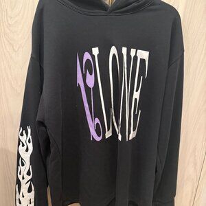 AUTHENTIC Vlone Palm Angels black hoodie with purple and white flame design.